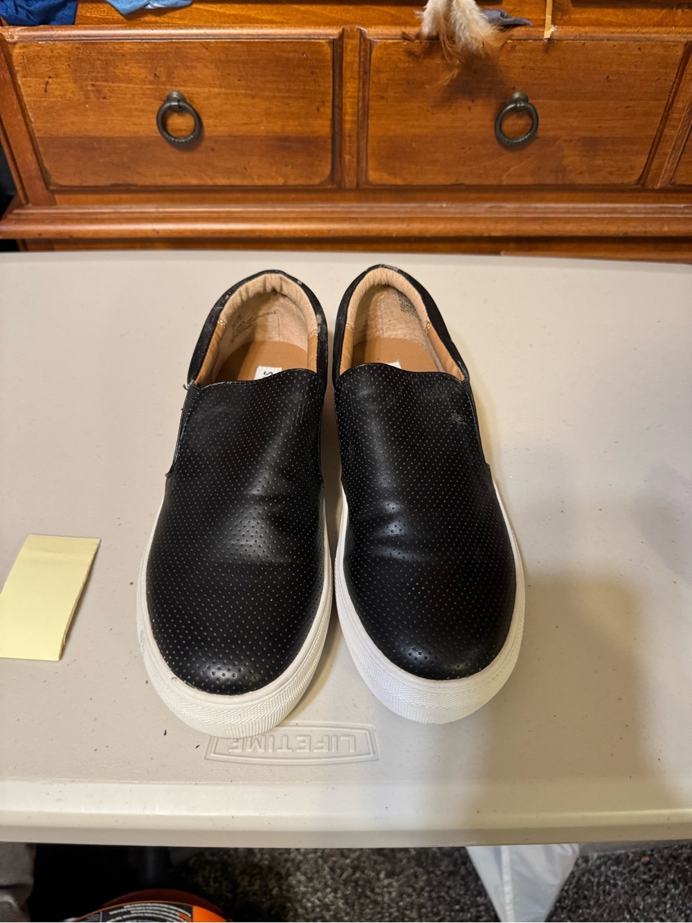 Steve Madden  Black Slip-On Perforated Leather Sneakers